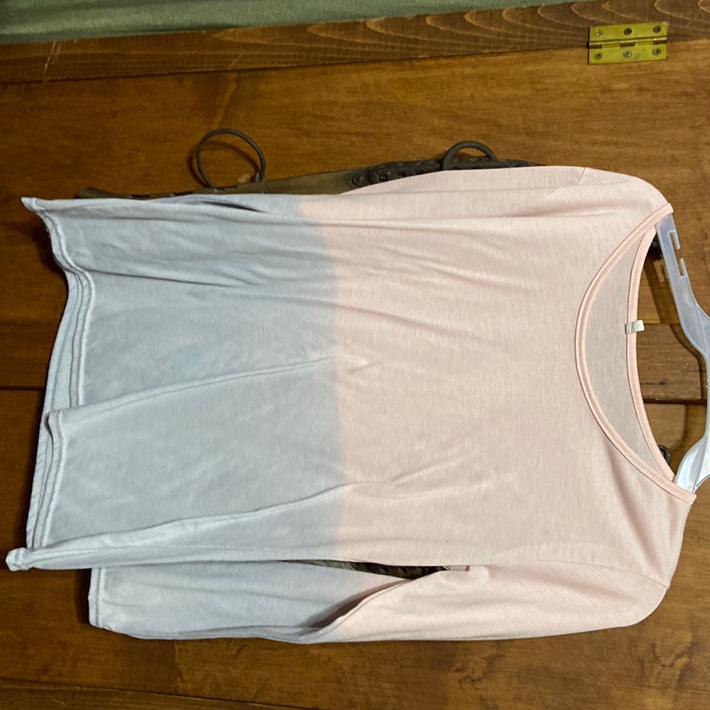 Size medium multicolored top. Never worn